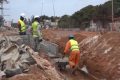 Pose de canalisation sur la route du nouveau port de Port-Gentil. © Gabonreview