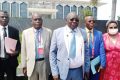 Bruno Ngoussi et les membres de sa plateforme devant le Palais Omar-Bongo du Sénat. © D.R.