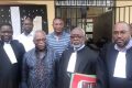 Guy Nzouba Ndama et ses avocats, le 18 octobre 2022, à Franceville. © AGP