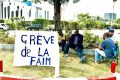 Jean Bernard Metsouma faisant sa grève de la faim devant la direction nationale de la BEAC à Libreville. © GabonReview